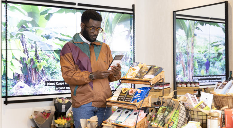 Man shopping at he Endangered Aisle for Fairtrade Fortnight 2023