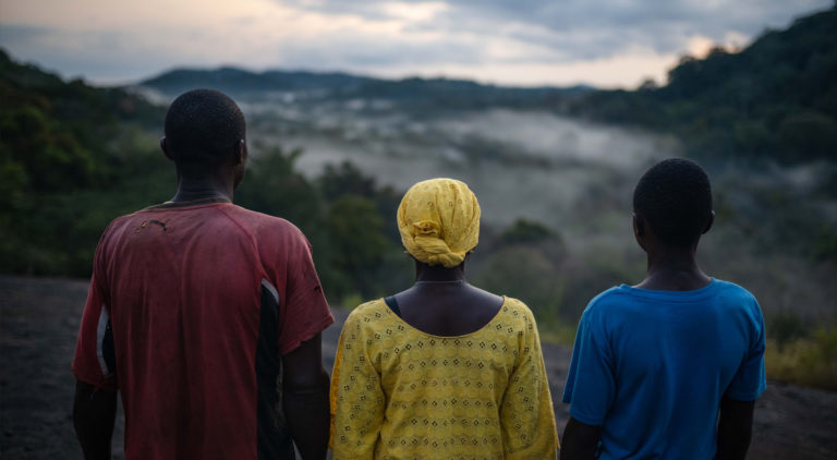 Lucia Mansaray, Sidie Sesay and Beshey looking out over the Gola Rainforest