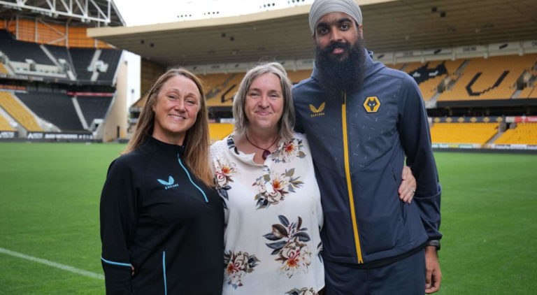 (L-r) Marnie Richards (Wolves Foundation), Julia Farrell, Chair of Wolverhampton City Fairtrade Partnership, Jeevan Kang (Wolves Foundation) at Molineux Stadium. Credit: Wolverhampton City Fairtrade Partnership.